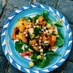 A bright, colorful butternut squash chickpea salad inspired by the flavors of Middle Eastern cuisine