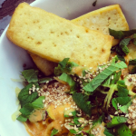 Healthy, delicious spaghetti squash noodle bowl with fresh and cooked veg, addictively delicious peanut lime sauce