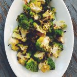 Romanesco tastes a bit like broccoli and cauliflower. Roasted romanesco, like most roasted vegetables, is delicious
