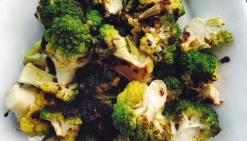 Romanesco tastes a bit like broccoli and cauliflower. Roasted romanesco, like most roasted vegetables, is delicious