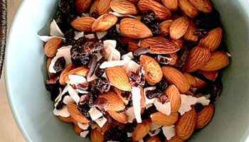 Homemade ageless trail mix with a few of our favorite things: coconut flakes, cacao nibs, and a little sweetness from the currants.