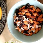 Homemade ageless trail mix with a few of our favorite things: coconut flakes, cacao nibs, and a little sweetness from the currants.