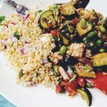 Summer version of salad nicoise with grilled zucchini, corn, fresh tomatoes