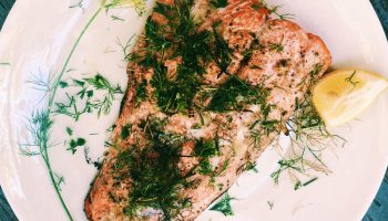 Wild-caught salmon simply grilled with dill, lemon, and butter