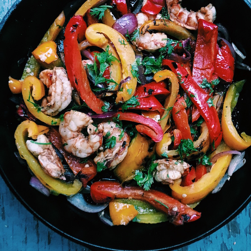 Shrimp fajitas, fresh bell peppers, tomatoes, corn, cilantro are an easy meal to throw together