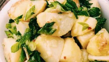 Savory potato salad with fresh herbs and lemons