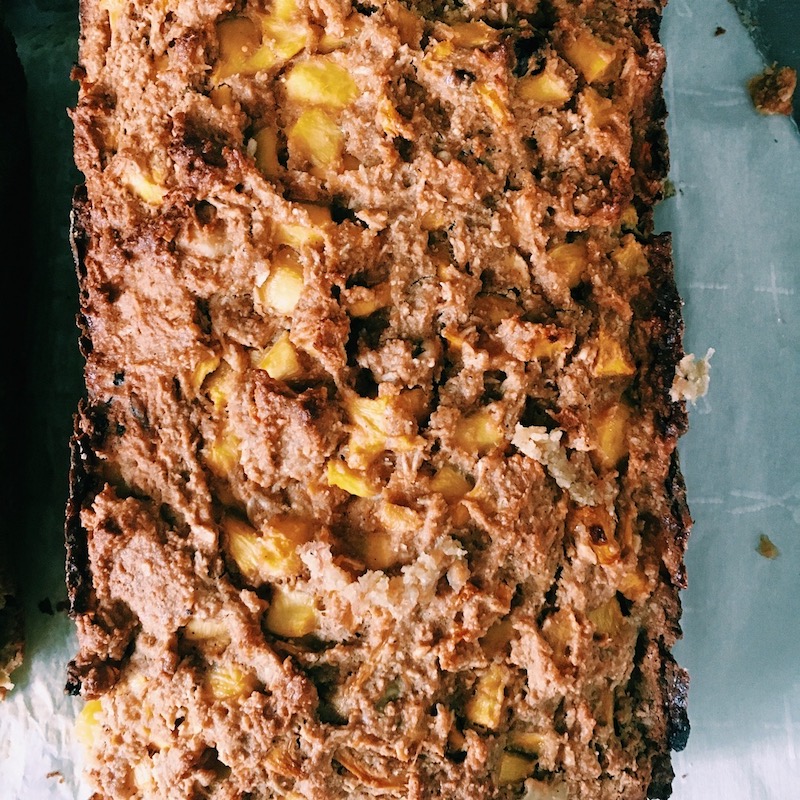 A delicious bread with mangoes, coconuts, and walnuts