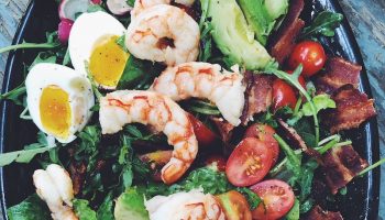 Shrimp Cobb Salad is simple, light, and delicious. With a fresh cilantro and lime dressing, this flavorful salad is easy to throw together. 