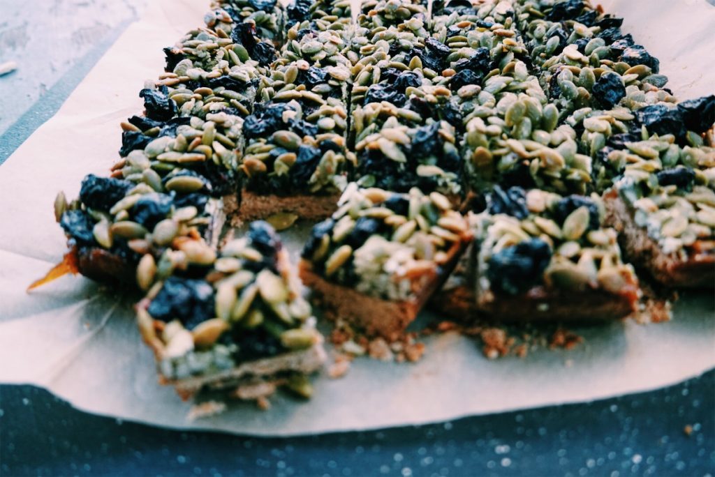 Hit that sweet tooth with these pumpkin seed, dried cherry bars
